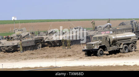 Israeli soldiers work at a staging area near the Gaza border as the Israeli military continues its operation against Hamas in Gaza, January 8, 2009, as seen from the Israeli-Gaza border.   (UPI Photo/Debbie Hill) Stock Photo