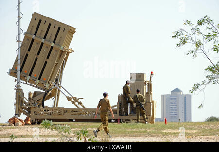 Israeli soldiers work on the Iron Dome, a new anti-rocket system, stationed near the southern city of Beersheba, Israel, March 27, 2011. The Israeli Defense Force deployed the $200 million Iron Dome system in response to dozens of rockets fired by Palestinian militants from Gaza in the past weeks. The Iron Dome is meant to protect Israeli towns from rockets fired from Gaza.   UPI/Debbie Hill Stock Photo
