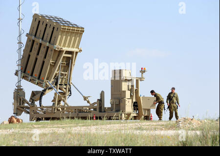 Israeli soldiers work on the Iron Dome, a new anti-rocket system, stationed near the southern city of Beersheba, Israel, March 27, 2011. The Israeli Defense Force deployed the $200 million Iron Dome system in response to dozens of rockets fired by Palestinian militants from Gaza in the past weeks. The Iron Dome is meant to protect Israeli towns from rockets fired from Gaza.   UPI/Debbie Hill Stock Photo