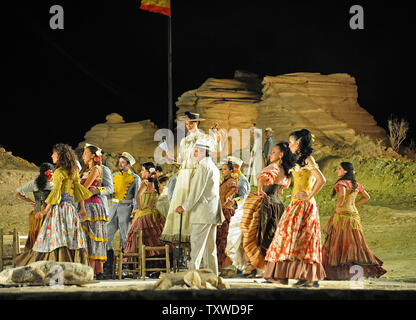 The Israeli Opera holds a dress rehearsal before the opening of the 2012 Israeli Opera Festival of Geroges Bizet's Carmen at the foot of the ancient fortress Masada, Israel, June 5, 2012.  More than 400 singers, performers, dancers and musicians are taking part in the production of Carmen on a special stage built on the desert floor. Masada is the site during the First Jewish-Roman War, where the siege of Masada by troops of the Roman Empire led to the mass suicide of the Jewish rebels. UPI/Debbie Hill Stock Photo