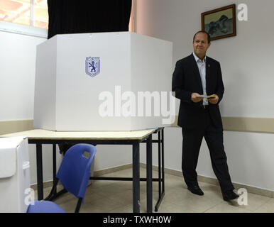 Jerusalem Mayor and candidate in Israel's municipal elections, Nir Barkat, casts his vote in a voting station in Jerusalem, Israel, October 22, 2013. UPI/Debbie Hill Stock Photo