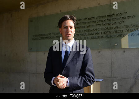 British Labour leader Ed Miliband speaks to the press after signing the guestbook outside the Children's Memorial in the Yad Vashem Holocaust Museum in Jerusalem, Israel, April 10, 2014. Miliband participated in a memorial ceremony where he rekindled the eternal flame in remembrance of Holocaust victims. It is the first of a three day visit to Israel and the Palestinian Authority.  UPI/Debbie Hill Stock Photo