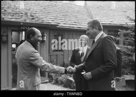 Anwar Sadat greets Ezer Weizman, Israeli Defense Minister Stock Photo