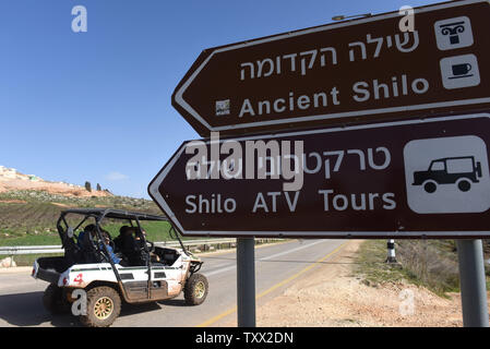 A sign points to Israeli tourists sites and activities in the Jewish settlement Shilo, West Bank, January 31, 2019. Amnesty International released a report calling on Airbnb, Booking.com, Expedia and Trip Advisor to boycott Israeli tourism sites over the pre-1967 lines, which they call 'Destination: Occupation.'     Photo by Debbie Hill/UPI Stock Photo
