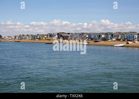 The colourful and highly sought after beach huts on Mudeford Spit (Mudeford Sandbank, Mudeford beach) at Hengistbury Head in Dorset Stock Photo