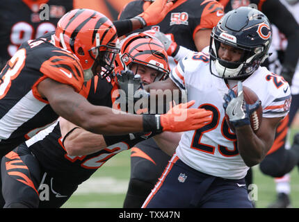 Baltimore, United States. 13th Oct, 2019. Baltimore Ravens quarterback Lamar  Jackson (C) hurdles Cincinnati Bengals defensive back Clayton Fejedelem  (42) for a short gain to the one yard line as Nick Vigil (