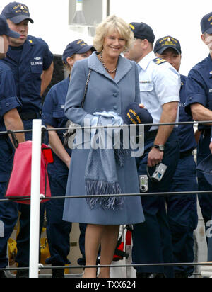 Camilla, The Duchess of Cornwall wife of Prince Charles, The Prince of Wales, stops for a photo with the crew of a US Coast Guard Cutter before disembark at the San Francisco Ferry Building to attend an environmental conference in San Francisco on November 7, 2005. (UPI Photo/Ken James) Stock Photo