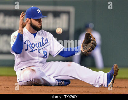 Kansas City Royals third baseman Mike Moustakas sits with an infield hit by New York Mets Lucas Duda that he was able to stop, but not make a play on, in the second inning of game 2 of the World Series at Kauffman Stadium in Kansas City, Missouri on October 28, 2015.    Photo by Kevin DietschUPI Stock Photo