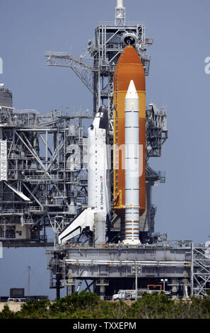 As the rotating service structure rolls back, NASA's Space Shuttle 'Endeavour' sits prepared for launch from Complex 39A on mission STS 127 from the Kennedy Space Center in Florida on June 12, 2009. Endeavour and her seven person crew will fly to the International Space Station to install the Kibo module as well as add equipment planned for future repairs during the planned sixteen day mission. (UPI Photo/Joe Marino - Bill Cantrell) Stock Photo