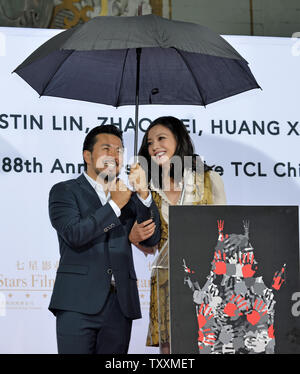 Director Justin Lin (L) and actress Zhao Wei attend the Handprint Ceremony commemorating the 88th birthday of the TCL Chinese Theatre IMAX in the Hollywood section of Los Angeles on June 3, 2015. In China, the number '8' is considered very lucky and is widely celebrated. Photo by Christine Chew/UPI Stock Photo