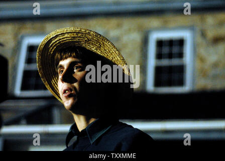 Elam King, 23 of Nickel Mines, watches as members of the media work, hours after a gunman stormed the Nickel Mines School House, barricading himself inside and killing several girls 'execution style' before turning the gun on himself, in Nickel Mines, PA on October 2, 2006. (UPI Photo/Kevin Dietsch) Stock Photo