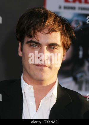 Actor Joaquin Phoenix poses for photographers at the premiere of the film, 'Ladder 49'  at The El Capitan Theatre  in Los Angeles, September 14, 2004. The Touchstone Pictures movie stars Phoenix along with John Travolta and opens in the US October 1st. (UPI Photo/Francis Specker) Stock Photo