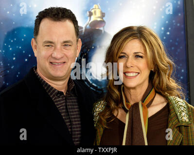 Actor Tom Hanks, left, and his wife, Rita Wilson, pose at the November 7, 2004 Los Angeles  premiere of the new animated film 'Polar Express'. The film, starring Hanks , is based on the children's book of the same name and directed by Robert Zemeckis, opens in the United States November 10. (UPI Photo/Francis Specker) Stock Photo