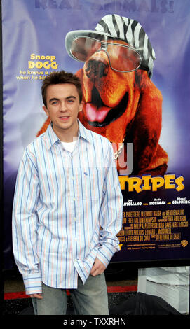 Actor Frankie Muniz arrives at the January 8, 2005 Los Angeles premiere of the film, ' Racing Stripes', at Grauman's Chinese Theatre. The film opens in the US on January 14. (UPI Photo/Francis Specker) Stock Photo