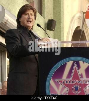 Former lead singer Steve Perry, of the rock band Journey, speaks during an unveiling ceremony honoring the group with the 2, 275th star on the Hollywood Walk of Fame, in Los Angeles, California January 21, 2005.     (UPI Photo/Lazlo Fitz) Stock Photo