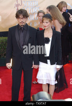 Actor Johnny Depp and wife Vanessa Paradis arrive to the 11th annual Screen Actors Guild awards February 5, 2005, in Los Angeles.    (UPI Photo/John Hayes) Stock Photo