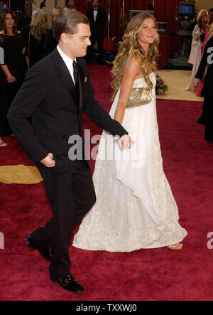 Actor Leonardo DiCaprio and his longtime girlfriend,  model Gisele Bundchen arrive at the 77th Academy Awards February 27, 2005, in Los Angeles. (UPI Photo/Jim Ruymen) Stock Photo