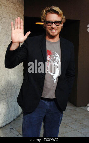 Australian actor Simon Baker, a cast member in the  motion picture 'Land of the Dead,' sports a t-shirt depicting a zombie at a special screening of the horror film in the Westwood section of Los Angeles June 20, 2005. In the 4th installment to George Romero's 'Night of the Living Dead' series, the zombies have taken over the earth. The surviving humans live on a a small secluded strip of land, with two sides cut off by rivers. The humans strive to survive while outside the zombies are steadlily evolving.   (UPI Photo/Jim Ruymen) Stock Photo