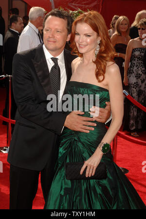 Marcia Cross, nominated for best lead actress in a comedy series for her role in 'Desperate Housewives', arrives with her finance, stockbroker Tom Mahoney at the 2005 Primetime Emmy Awards in Los Angeles September 18, 2005.   (UPI Photo/Jim Ruymen) Stock Photo