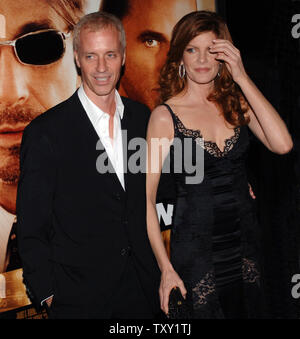 Actress Rene Russo (R), who stars in the motion picture crime drama 'Two for the Money' and her husband, writer Dan Gilroy, arrive for the premiere of the film at the Academy of Motion Picture Arts & Sciences in Beverly Hills, California September 26, 2005.   (UPI Photo/Jim Ruymen) Stock Photo