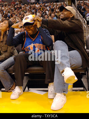 NO FILM, NO VIDEO, NO TV, NO DOCUMENTARY - Movie Director Spike Lee cheers  during the NBA basketball match, Washington Wizards vs New York Knicks at  the Verizon Center in Washington, DC