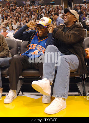 NO FILM, NO VIDEO, NO TV, NO DOCUMENTARY - Movie Director Spike Lee cheers  during the NBA basketball match, Washington Wizards vs New York Knicks at  the Verizon Center in Washington, DC