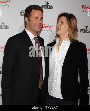 Actor Will Ferrell (L), a cast member in the motion picture musical comedy 'The Producers' arrives with his wife, Swedish actress Vivica Paulin in Los Angeles, California December 12, 2005. A show biz phenomenon and paradigm of political incorrectness, 'The Producers' will be unveiled in its third incarnation with the opening of a movie based on the smash Broadway musical, which was in turn, based on Mel Brook's 1968 film that first spawned the splendour of 'Springtime for Hitler.'  (UPI Photo/Jim Ruymen) Stock Photo