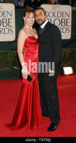 British actor Naveen Andrews, nominated for best supporting actor in a series, mini-series or television movie for his work on 'Lost,' arrives with partner Barbara Hershey for the 63rd Annual Golden Globe Awards on Monday, Jan. 16, 2006, in Beverly Hills, Calif. (UPI Photo/Jim Ruymen) Stock Photo