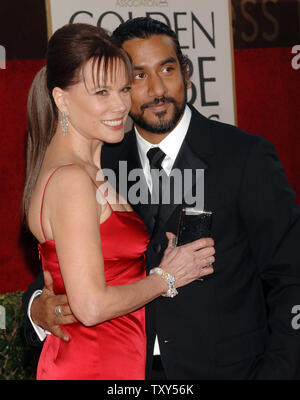 British actor Naveen Andrews, nominated for best supporting actor in a series, mini-series or television movie for his work on 'Lost,' arrives with partner Barbara Hershey for the 63rd Annual Golden Globe Awards on Monday, Jan. 16, 2006, in Beverly Hills, Calif. (UPI Photo/Jim Ruymen) Stock Photo