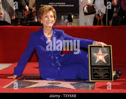 Judge Judy Sheindlin, the star of television's number one syndicated courtroom series that bears her name, smiles for photographers during a ceremony honoring her with the 2,304th star on the Hollywood Walk of Fame in Los Angeles, California February 14, 2006.  (UPI Photo/Jim Ruymen) Stock Photo