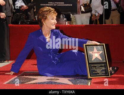 Judge Judy Sheindlin, the star of television's number one syndicated courtroom series that bears her name, smiles for photographers during an unveiling ceremony honoring her with the 2,304th star on the Hollywood Walk of Fame in Los Angeles, California February 14, 2006.  (UPI Photo/Jim Ruymen) Stock Photo