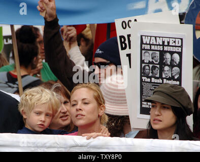 Anti-war demonstrators, including actress Maria Bello holding her son Jackson Blue McDermott (5), march in protest on the third anniversary of the U.S. invasion of Iraq in the Hollywood section of Los Angeles, California March 18, 2006. Thousands of ant-war protesters took to the streets around the world Saturday calling for U.S. and British troops to pull out.  (UPI Photo/Jim Ruymen)