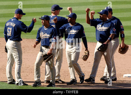 San Diego Padres closer Trevor Hoffman and his three sons watch a tribute  to his career on the scoreboard screen at PETCO Park after Hoffman became  baseball's all-time save leader in the