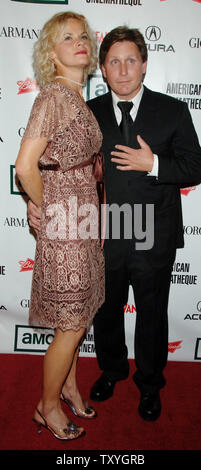 Actor and director Emilio Estevez (R) and fiancee Sonja Magdevski arrive at the American Cinematheque annual benefit gala in Beverly Hills, California on October 13, 2006. Actor George Clooney was honored with the 21st American Cinematheque Award at the gala. (UPI Photo/Jim Ruymen) Stock Photo