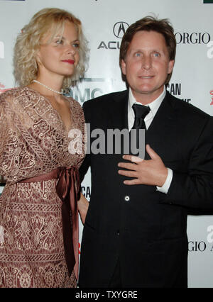 Actor and director Emilio Estevez (R) and fiancee Sonja Magdevski arrive at the American Cinematheque annual benefit gala in Beverly Hills, California on October 13, 2006. Actor George Clooney was honored with the 21st American Cinematheque Award at the gala. (UPI Photo/Jim Ruymen) Stock Photo