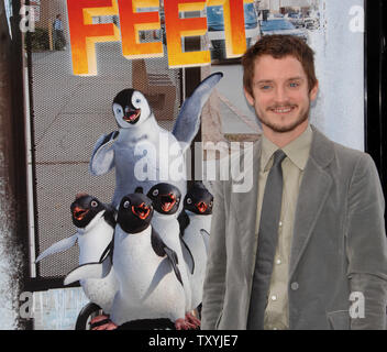 Actor Elijah Wood, who provides the voice of Mumble in the animated motion picture comedy 'Happy Feet', arrives for the premiere of the film at Grauman's Chinese Theatre in the Hollywood section of Los Angeles, California on November 12, 2006.  (UPI Photo/Jim Ruymen) Stock Photo