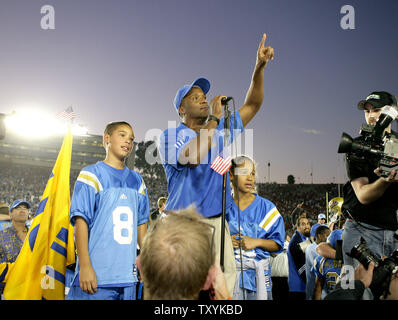 UCLA head coach Karl Dorrell celebrates after UCLA upset No. 21 ...