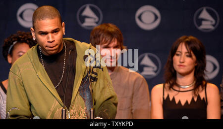 Singer Chris Brown (L), who received a nomination for best new artist announces nominees during the 49th Annual Grammy Awards nominations news conference in Los Angeles on December 7, 2006. Looking on are fellow presenters, British singers Corinne Bailey Rae, James Blunt and KT Tunstall. The Grammys will take place in Los Angeles on Feb. 11, 2007. (UPI Photo/Jim Ruymen) Stock Photo