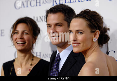 Director of the film Susannah Grant (L-R) and cast members Timothy Olyphant and Jennifer Garner pose for photographers at the world premiere of 'Catch and Release' held at the Grauman's Egyptian Theatre in Los Angeles on January 22, 2007. (UPI Photo/ Phil McCarten) Stock Photo