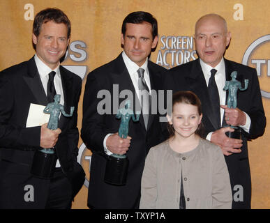 The cast of the film 'Little Miss Sunshine', which won for outstanding cast in a motion picture, (L-R) Greg Kinnear, Steve Carell, Alan Arkin and Abigail Breslin (bottom) appear backstage at the 13th Annual Screen Actors Guild Awards in Los Angeles on January 28, 2007. (UPI Photo/Jim Ruymen) Stock Photo