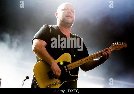 Black Francis, also known as Frank Black, performs with American grunge rock band The Pixies at Glastonbury Festival in 2014. Glastonbury Festival of Contemporary Performing Arts is the largest music festival in UK, attracting over 135,000 people each to Pilton, Somerset. Stock Photo