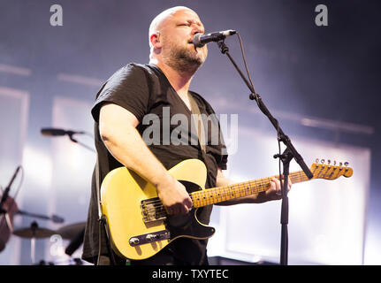 Black Francis, also known as Frank Black, performs with American grunge rock band The Pixies at Glastonbury Festival in 2014. Glastonbury Festival of Contemporary Performing Arts is the largest music festival in UK, attracting over 135,000 people each to Pilton, Somerset. Stock Photo