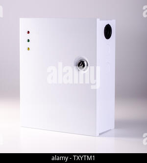 Power Supply box isolated on a white background. Video or fire security equipment Stock Photo