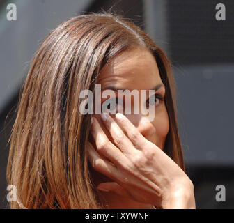 Academy Award-winning actress Halle Berry wipes away tears during ceremonies unveiling her star on the Hollywood Walk of Fame in Los Angeles on April 3, 2007. (UPI Photo/Jim Ruymen) Stock Photo