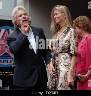 Film producer Jon Peters and his wife Mindy pose after ceremonies unveiling his star on the Hollywood Walk of Fame in Los Angeles on May 1, 2007. Peters produced the 1976 film 'A Star is Born,' starring Barbra Streisand, and other films such as 'Flashdance,' 'Rain Man,' 'Batman,' and 'Superman Returns.' (UPI Photo/Jim Ruymen) Stock Photo