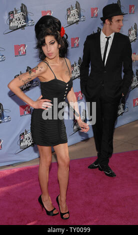 British singer Amy Winehouse arrives with her husband Blake Fiedler-Civil for the MTV Movie Awards in Los Angeles on June 3, 2007.  (UPI Photo/Jim Ruymen) Stock Photo