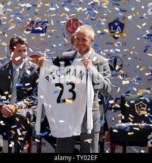 David Beckham holds up his jersey at the official presentation of David  Beckham to the Los Angeles Galaxy at the Home Depot Center in Carson, CA on  July13, 2007. Photo credit: Francis