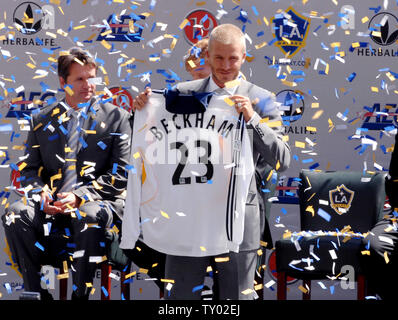 David Beckham holds up his jersey at the official presentation of David  Beckham to the Los Angeles Galaxy at the Home Depot Center in Carson, CA on  July13, 2007. Photo credit: Francis