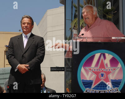 International film and television star Eric Braeden (L), who joined the cast of 'The Young and the Restless' as business tycoon Victor Newman in 1980, stands as actor George Kennedy speaks during an unveiling ceremony honoring Braeden with the 2,342nd star on the Hollywood Walk of Fame in Los Angeles, California on July 20, 2007.  (UPI Photo Jim Ruymen)
