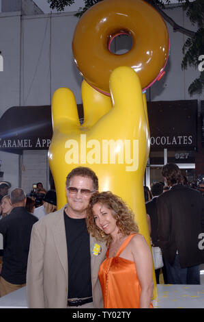 Albert Brooks, the voice of Russ Cargill in the animated motion picture comedy 'The Simpsons Movie,' arrives with his wife Kimberly Shlain at the premiere of the film in the Westwood section of Los Angeles on July 24, 2007. (UPI Photo/Jim Ruymen) Stock Photo